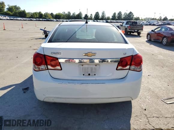 2013 Chevrolet Cruze 2LT z VIN 1G1PE5SB9D7245266, wystawiony jako Copart lot #70882115 z przebiegiem 152 070 mil mil oraz Czysty tytuł • Clean title. Historia ofert i sprzedaży dostępna na DreamBid. Obrazek 6.