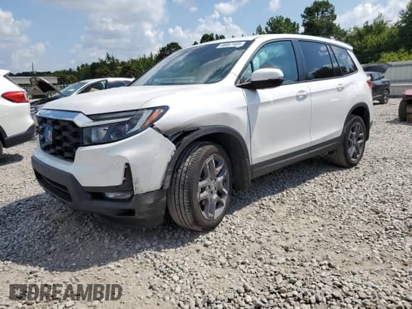 2023 Honda Passport EX-L with VIN 5FNYF8H5XPB018355, listed as a Copart auction lot 66667405 with 26,126 mi miles and Salvage title. Bid and sale history available at DreamBid. Image 1.