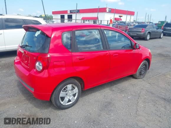 2011 Chevrolet Aveo 1LT with VIN KL1TD6DE0BB138811, listed as a IAAI auction lot 42469958 with 76,830 mi miles and . Bid and sale history available at DreamBid. Image 4.