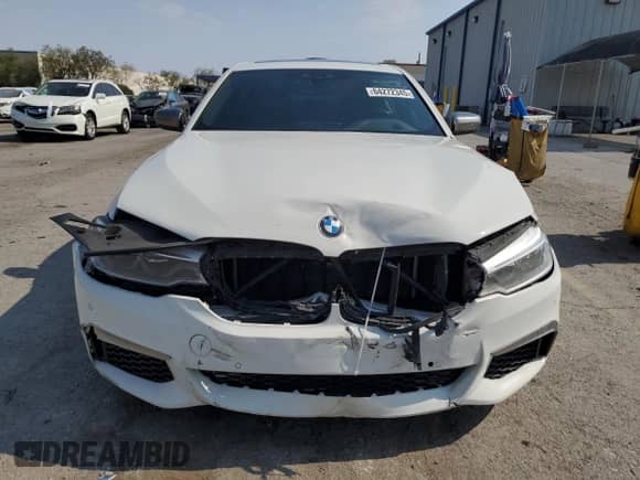 2020 BMW 5 Series M550i xDrive with VIN WBAJS7C02LBN96544, listed as a Copart auction lot 64272345 with 42,734 mi miles and Salvage title. Bid and sale history available at DreamBid. Image 5.