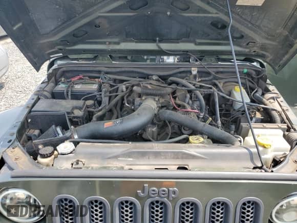 2007 Jeep Wrangler Sahara z VIN 1J8FA54137L145641, wystawiony jako Copart lot #60125185 z przebiegiem 160 119 mil mil oraz Szkoda całkowita • Salvage title. Historia ofert i sprzedaży dostępna na DreamBid. Obrazek 12.