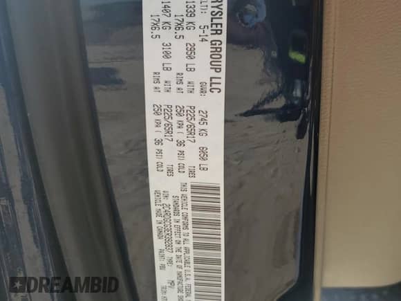 2014 Dodge Grand Caravan SXT z VIN 2C4RDGCG3ER392837, wystawiony jako Copart lot #67765995 z przebiegiem 164 919 mil mil oraz Szkoda całkowita • Salvage title. Historia ofert i sprzedaży dostępna na DreamBid. Obrazek 13.
