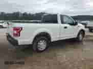 2018 Ford F-150 XL with VIN 1FTMF1CB1JFD61156, listed as a Copart auction lot 86083085 with 114,798 mi miles and Clean title. Bid and sale history available at DreamBid. Image 3.
