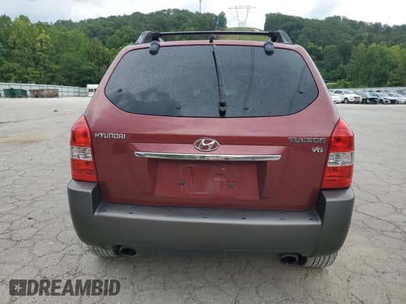 2009 Hyundai Tucson SE with VIN KM8JN12D79U941281, listed as a Copart auction lot 67221365 with 142,585 mi miles and Salvage title. Bid and sale history available at DreamBid. Image 6.