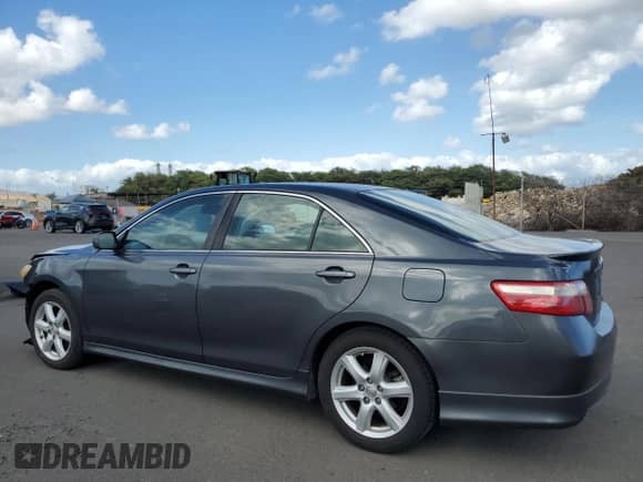 2007 Toyota Camry LE z VIN 4T1BK46K67U505462, wystawiony jako Copart lot #69739655 z przebiegiem 82 517 mil mil oraz Szkoda całkowita • Salvage title. Historia ofert i sprzedaży dostępna na DreamBid. Obrazek 2.