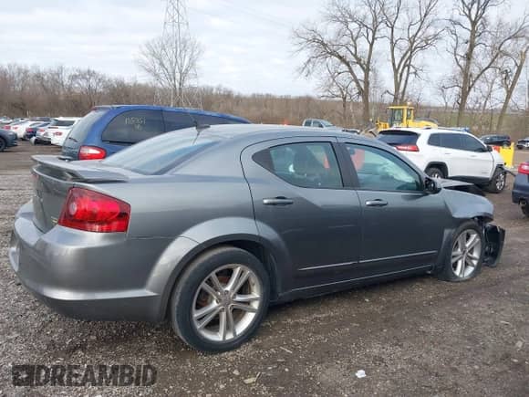 2011 Dodge Avenger Heat with VIN 1B3BD1FGXBN584583, listed as a IAAI auction lot 41042293 with 162,976 mi miles and . Bid and sale history available at DreamBid. Image 13.