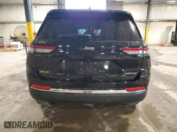 2023 Jeep Grand Cherokee Altitude with VIN 1C4RJHAGXPC646895, listed as a Copart auction lot 69633245 with 13,059 mi miles and Salvage title. Bid and sale history available at DreamBid. Image 6.