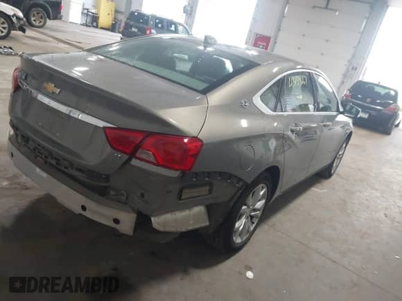 2018 Chevrolet Impala LT with VIN 2G1105S38J9106513, listed as a IAAI auction lot 43139667 with 134,635 mi miles and . Bid and sale history available at DreamBid. Image 4.