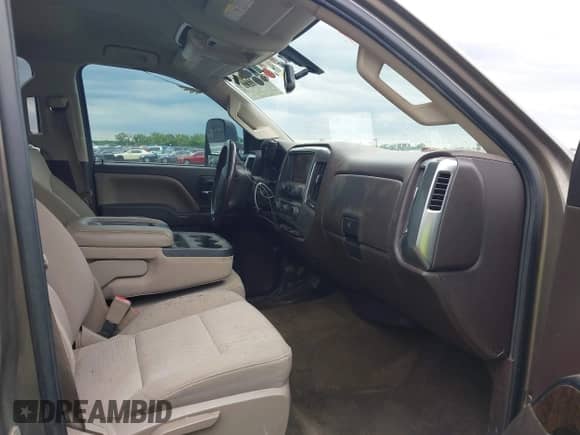 2015 Chevrolet Silverado 2500HD LT z VIN 1GC1KVEG0FF131663, wystawiony jako IAAI lot #42117911 z przebiegiem 144 511 mil mil oraz . Historia ofert i sprzedaży dostępna na DreamBid. Obrazek 5.