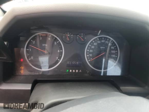 2010 Dodge 1500 ST z VIN 3D7JB1EP1AG177119, wystawiony jako Copart lot #74556704 z przebiegiem 303 105 mil mil oraz Szkoda całkowita • Salvage title. Historia ofert i sprzedaży dostępna na DreamBid. Obrazek 9.