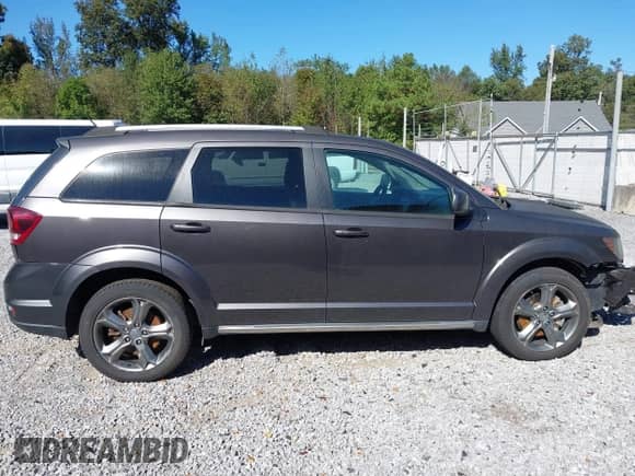 2017 Dodge Journey Crossroad with VIN 3C4PDCGB9HT677476, listed as a IAAI auction lot 43301924 with 163,098 mi miles and . Bid and sale history available at DreamBid. Image 13.