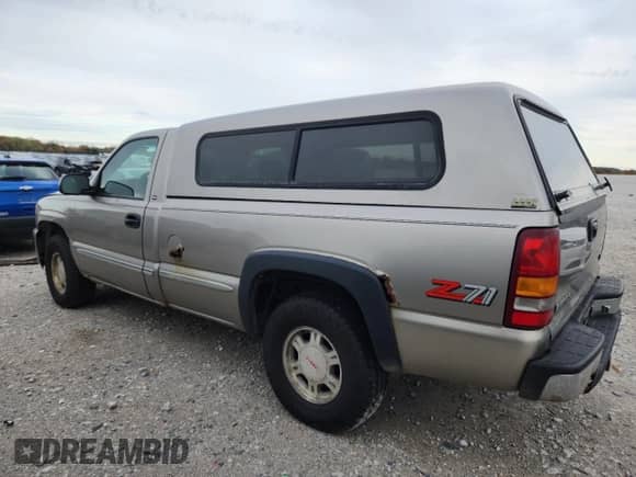 1999 GMC Sierra 1500 SLE z VIN 1GTEK14T4XE504638, wystawiony jako Copart lot #89474065 z przebiegiem 203 713 mil mil oraz Czysty tytuł • Clean title. Historia ofert i sprzedaży dostępna na DreamBid. Obrazek 2.