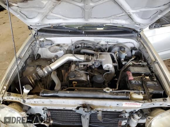 2002 Toyota Tacoma with VIN 5TENL42N72Z087380, listed as a Copart auction lot 84454855 with 291,069 mi miles and Salvage title. Bid and sale history available at DreamBid. Image 11.