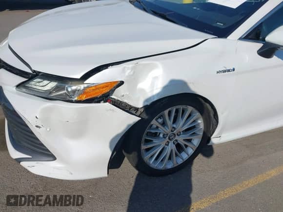 2020 Toyota Camry Hybrid XLE with VIN 4T1F31AK4LU523702, listed as a IAAI auction lot 42734831 with 144,778 mi miles and . Bid and sale history available at DreamBid. Image 6.