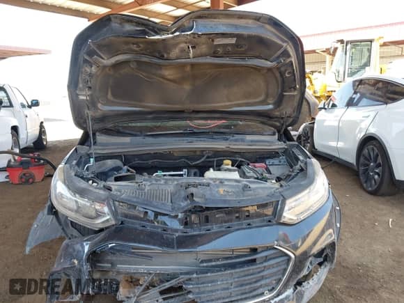 2020 Chevrolet Trax LS with VIN 3GNCJNSB1LL214659, listed as a IAAI auction lot 42428118 with 72,975 mi miles and . Bid and sale history available at DreamBid. Image 10.
