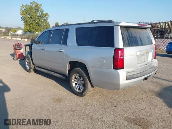 2020 Chevrolet Suburban LT with VIN 1GNSKHKC6LR304885, listed as a IAAI auction lot 43213423 with 179,235 mi miles and . Bid and sale history available at DreamBid. Image 3.
