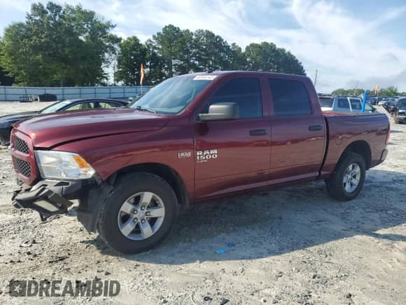2019 Ram 1500 Express with VIN 3C6RR6KT1KG649643, listed as a Copart auction lot 60594145 with 121,740 mi miles and Salvage title. Bid and sale history available at DreamBid. Image 1.