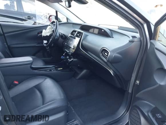 2022 Toyota Prius Nightshade with VIN JTDKAMFU4N3155017, listed as a IAAI auction lot 43013402 with 146,084 mi miles and . Bid and sale history available at DreamBid. Image 5.