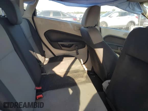 2013 Ford Fiesta S z VIN 3FADP4TJ1DM215176, wystawiony jako Copart lot #70181585 z przebiegiem 133 942 mil mil oraz Szkoda całkowita • Salvage title. Historia ofert i sprzedaży dostępna na DreamBid. Obrazek 10.