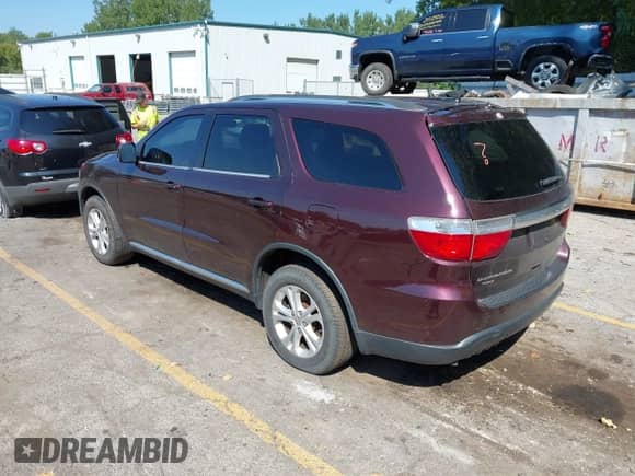 2012 Dodge Durango Crew with VIN 1C4RDJDG1CC153000, listed as a IAAI auction lot 43136614 with 186,788 mi miles and . Bid and sale history available at DreamBid. Image 3.