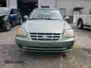 2005 Hyundai Accent GLS с VIN KMHCG35C05U325871, выставлен на аукционе Copart как лот 64258985 с пробегом 166 574 миль миль и Списание • Salvage title. История ставок и продаж доступна на DreamBid. Изображение 5.