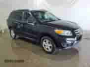 2012 Hyundai Santa Fe GLS с VIN 5XYZGDAB0CG115738, выставлен на аукционе Copart как лот 62925954 с пробегом 121 078 миль миль и Списание • Salvage title. История ставок и продаж доступна на DreamBid. Изображение 4.