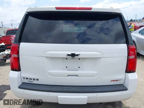 2020 Chevrolet Tahoe LT with VIN 1GNSCBKC0LR290170, listed as a IAAI auction lot 42129712 with 57,414 mi miles and . Bid and sale history available at DreamBid. Image 16.