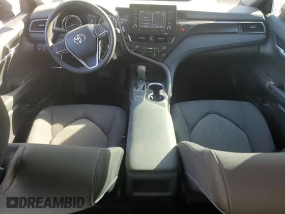 2023 Toyota Camry LE z VIN 4T1C11AK2PU185392, wystawiony jako Copart lot #81824225 z przebiegiem 31 281 mil mil oraz Szkoda całkowita • Salvage title. Historia ofert i sprzedaży dostępna na DreamBid. Obrazek 8.