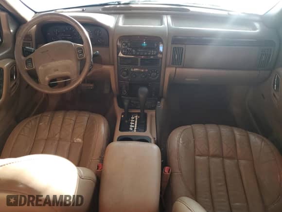 2000 Jeep Grand Cherokee Limited z VIN 1J4GW58N0YC419352, wystawiony jako Copart lot #86405605 z przebiegiem 211 579 mil mil oraz Czysty tytuł • Clean title. Historia ofert i sprzedaży dostępna na DreamBid. Obrazek 8.