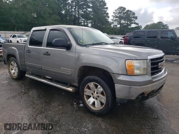 2007 GMC Sierra 1500 SLT with VIN 2GTEC13J071564253, listed as a Copart auction lot 57311735 with 364,644 mi miles and Salvage title. Bid and sale history available at DreamBid. Image 4.