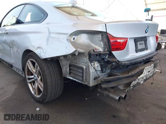 2014 BMW 4 Series 428i z VIN WBA3N7C58EF719514, wystawiony jako IAAI lot #42310537 z przebiegiem 82 573 mil mil oraz . Historia ofert i sprzedaży dostępna na DreamBid. Obrazek 6.