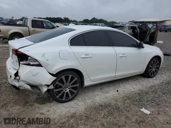 2014 Volvo S60 T5 с VIN YV1612FSXE2289504, выставлен на аукционе Copart как лот 61221985 с пробегом 121 033 миль миль и Списание • Salvage title. История ставок и продаж доступна на DreamBid. Изображение 3.