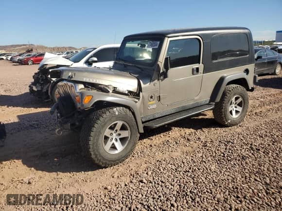 2005 Jeep Wrangler with VIN 1J4FA64S25P355797, listed as a Copart auction lot 77492034 with 116,413 mi miles and Salvage title. Bid and sale history available at DreamBid. Image 1.