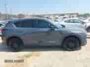 2022 Mazda CX-5 S Preferred z VIN JM3KFBCMXN1534309, wystawiony jako IAAI lot #42600606 z przebiegiem 40 529 mil mil oraz . Historia ofert i sprzedaży dostępna na DreamBid. Obrazek 13.