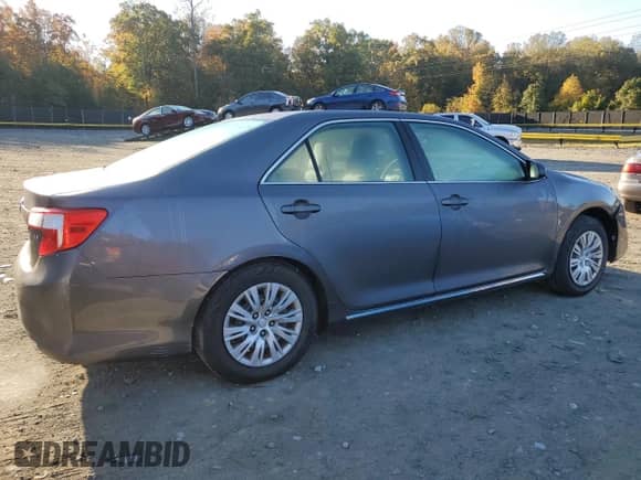 2014 Toyota Camry XLE z VIN 4T4BF1FK3ER350620, wystawiony jako Copart lot #87195205 z przebiegiem 84 279 mil mil oraz Szkoda całkowita • Salvage title. Historia ofert i sprzedaży dostępna na DreamBid. Obrazek 3.