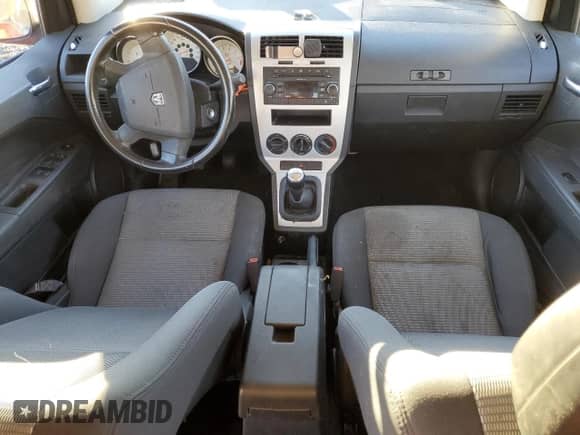2009 Dodge Caliber SXT with VIN 1B3HB48C99D144317, listed as a Copart auction lot 79491144 with Not provided miles and Salvage title. Bid and sale history available at DreamBid. Image 8.