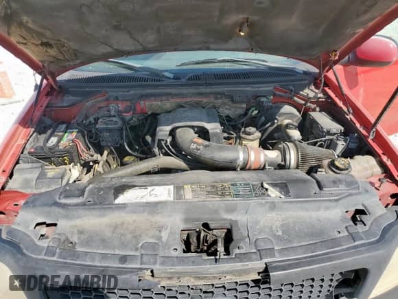 2000 Ford F-150 XL with VIN 1FTRX07WXYKB39193, listed as a Copart auction lot 85164785 with 296,921 mi miles and Salvage title. Bid and sale history available at DreamBid. Image 11.