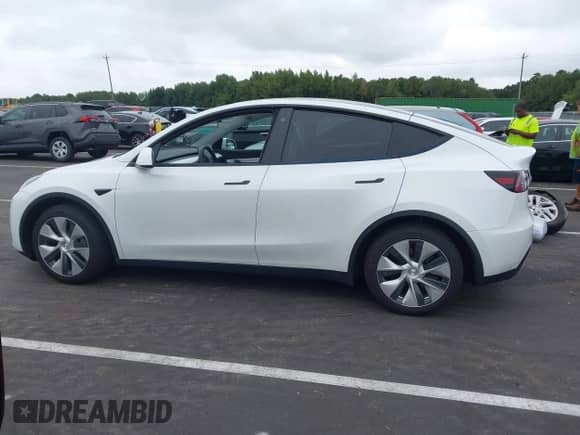 2022 Tesla Model Y Long Range z VIN 7SAYGDEE6NF317707, wystawiony jako IAAI lot #43186532 z przebiegiem 45 306 mil mil oraz . Historia ofert i sprzedaży dostępna na DreamBid. Obrazek 15.