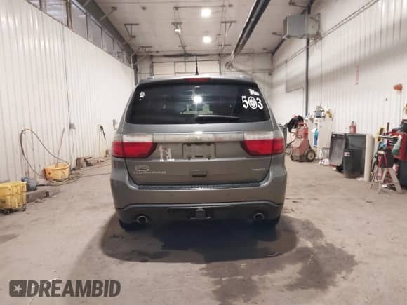2012 Dodge Durango Crew with VIN 1C4SDJDT2CC309415, listed as a IAAI auction lot 42304287 with 150,964 mi miles and . Bid and sale history available at DreamBid. Image 16.