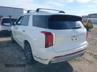 2024 Hyundai Palisade Calligraphy с VIN KM8R7DGE9RU721740, выставлен на аукционе IAAI как лот 41485304 с пробегом 23 527 миль миль и . История ставок и продаж доступна на DreamBid. Изображение 3.
