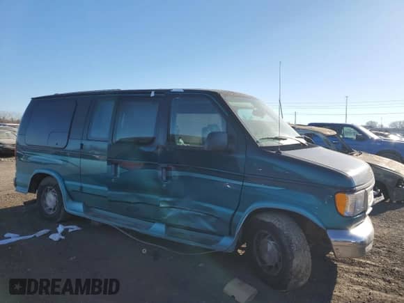 1999 Ford Econoline Cargo Recreational with VIN 1FDRE14L6XHC18387, listed as a Copart auction lot 46744285 with 138,588 mi miles and Salvage title. Bid and sale history available at DreamBid. Image 4.