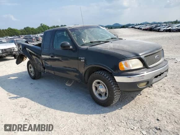1999 Ford F-150 z VIN 1FTRX18W1XNA90998, wystawiony jako Copart lot #59217415 z przebiegiem Nie podano mil oraz Szkoda całkowita • Salvage title. Historia ofert i sprzedaży dostępna na DreamBid. Obrazek 4.