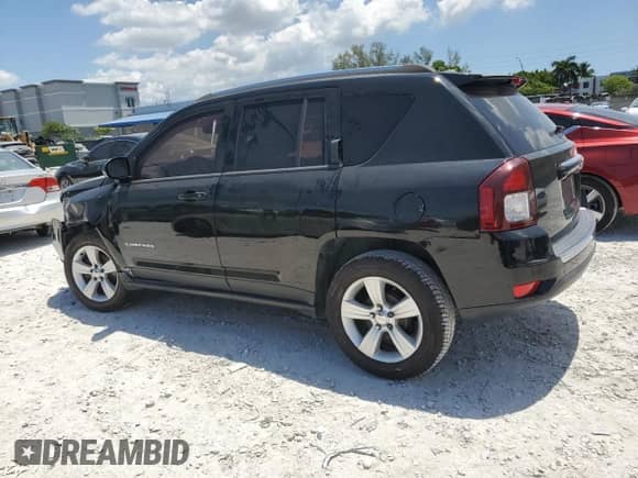 2015 Jeep Compass High Altitude with VIN 1C4NJCEA0FD178823, listed as a Copart auction lot 57904775 with 106,240 mi miles and Salvage title. Bid and sale history available at DreamBid. Image 2.