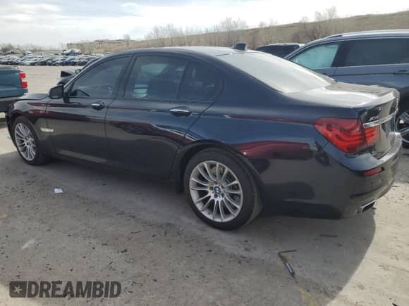 2015 BMW 7 Series 750i xDrive with VIN WBAYB6C55FD225259, listed as a Copart auction lot 51104975 with 93,307 mi miles and Salvage title. Bid and sale history available at DreamBid. Image 2.