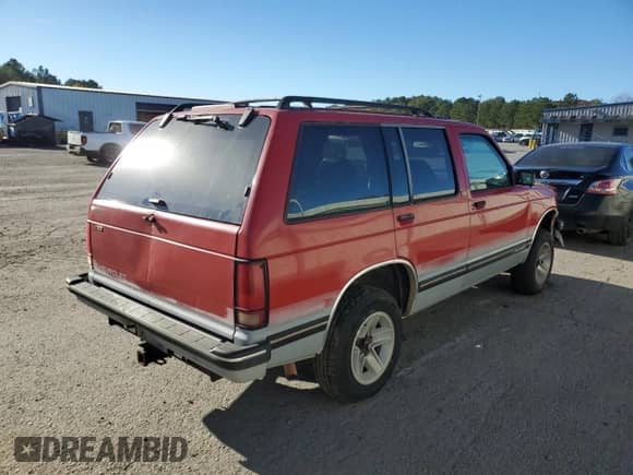 1994 Chevrolet Blazer LS с VIN 1GNCS13W6R2157005, выставлен на аукционе Copart как лот 82147884 с пробегом 191 039 миль миль и Списание • Salvage title. История ставок и продаж доступна на DreamBid. Изображение 3.
