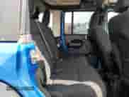 2023 Jeep Wrangler Sport S with VIN 1C4HJXDG7PW677814, listed as a Copart auction lot 67802085 with 28,546 mi miles and Salvage title. Bid and sale history available at DreamBid. Image 11.