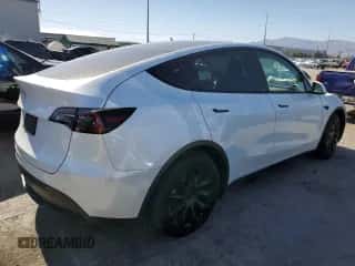 2021 Tesla Model Y Performance with VIN 5YJYGAED6MF181502, listed as a Copart auction lot 58582634 with 33,772 mi miles and Salvage title. Bid and sale history available at DreamBid. Image 3.