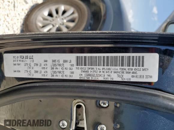 2018 Ram 1500 SLT z VIN 1C6RR6GG2JS234110, wystawiony jako Copart lot #67271245 z przebiegiem 99 170 mil mil oraz Szkoda całkowita • Salvage title. Historia ofert i sprzedaży dostępna na DreamBid. Obrazek 12.