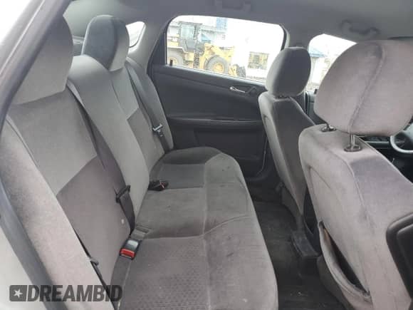 2012 Chevrolet Impala LS Retail z VIN 2G1WA5E38C1108696, wystawiony jako Copart lot #85854645 z przebiegiem 252 483 mil mil oraz Szkoda całkowita • Salvage title. Historia ofert i sprzedaży dostępna na DreamBid. Obrazek 10.
