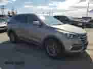 2018 Hyundai Santa Fe 2.4L с VIN 5NMZT3LB1JH089446, выставлен на аукционе Copart как лот 87306895 с пробегом 95 904 миль миль и Списание • Salvage title. История ставок и продаж доступна на DreamBid. Изображение 4.